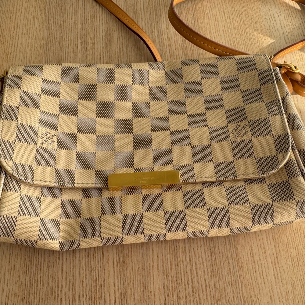 clutch Louis Vuitton